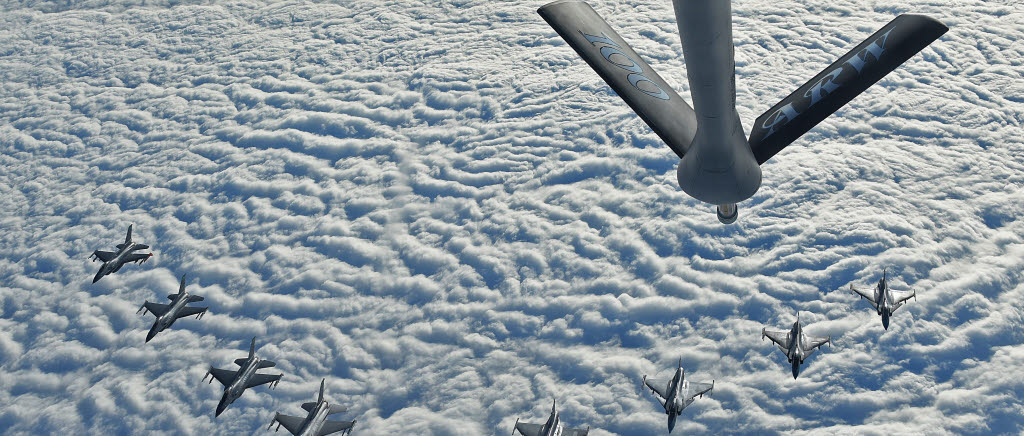 Four U.S. Air Force F-16C Fighting Falcons and four Swedish Air Force JAS 39 Gripens fly in formation together behind a U.S. Air Force KC-135 Stratotanker during aerial refueling training in Swedish airspace, Feb. 8, 2018. The air refueling training is in conjunction with a rotational deployment of F-16Cs from the Ohio Air National Guard‚Äôs 180th Fighter Wing to Amari Air Base, Estonia, as part of a Theater Security Package. The training allows the U.S. and Sweden to strengthen interoperability and increase readiness.  (U.S. Air Force photo by Airman 1st Class Luke Milano)
