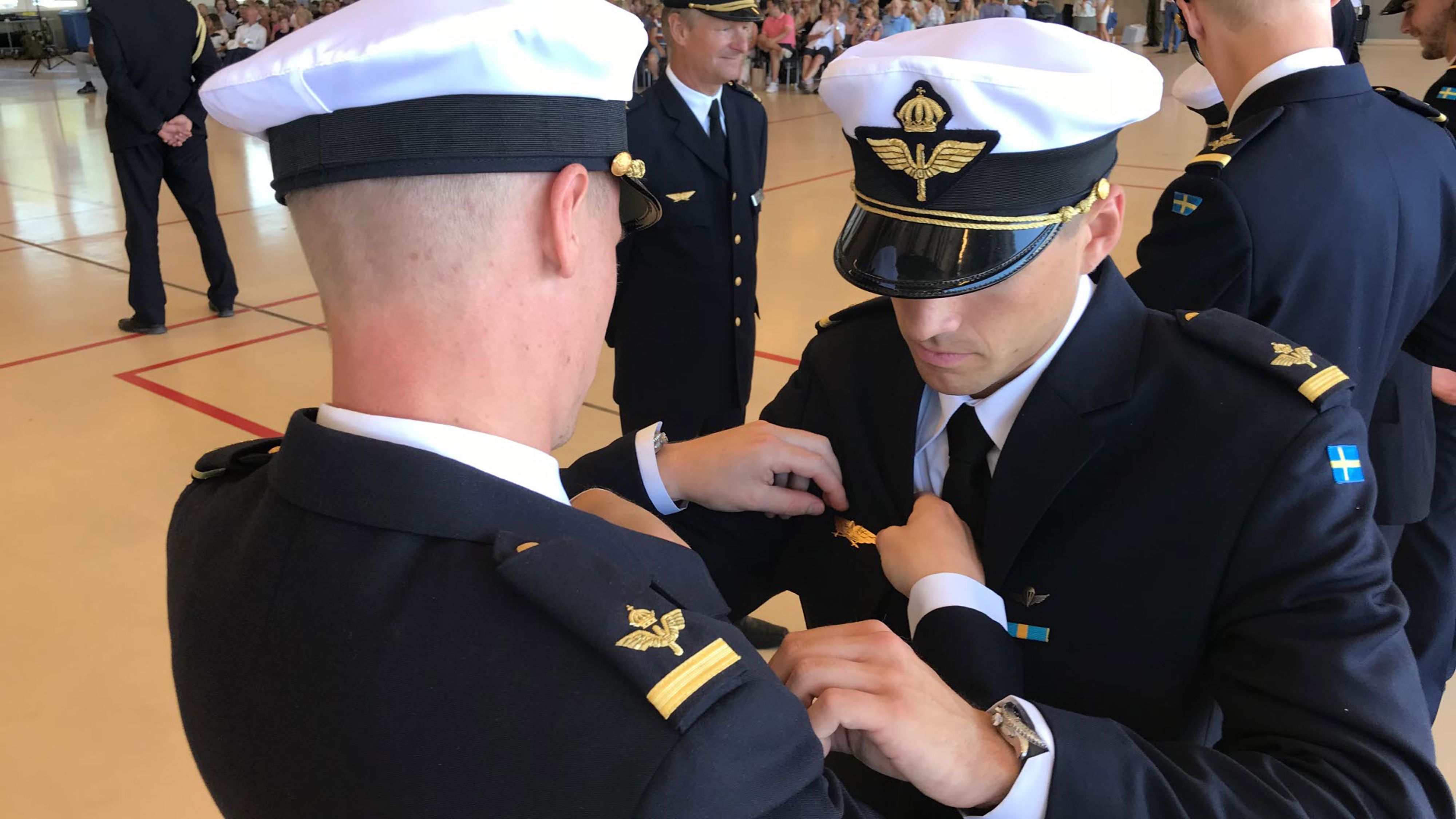 Pilot som tar examen.